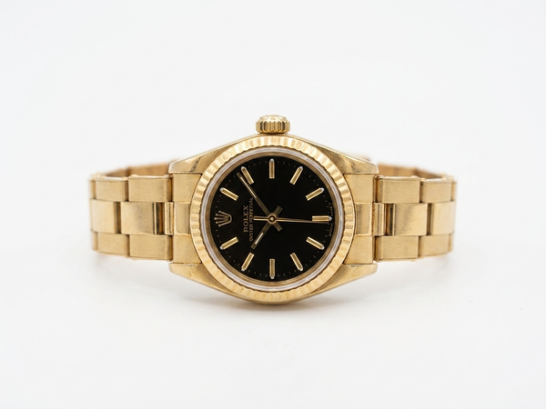 Montre Rolex femme Oyster perpetual année 1990 en or 750/1000