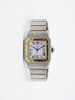 Montre Cartier «  SANTOS » Galbé Or et acier.