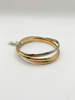 Bracelet modèle "Trinity" de "Cartier" 3 ors 750/1000
