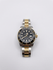 Montre Rolex Submariner or 750/1000 et acier, année 2018
