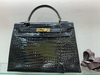 Sac Hermès Kelly croco noir