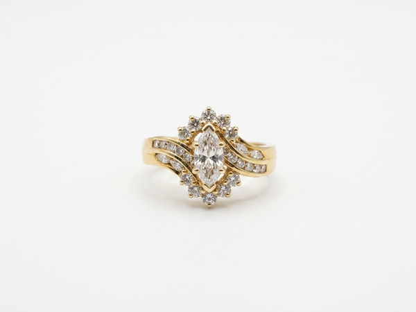 Bague or jaune Marquise et diamants brillants