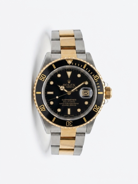 MONTRE ROLEX SUBMARINER OR ET ACIER, année 1985