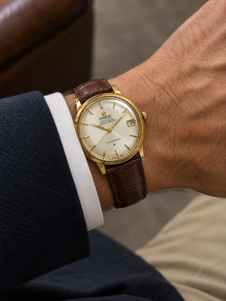 Montre Vintage Oméga "Constellation" Or jaune et cuir