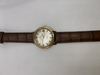 Montre Vintage Oméga "Constellation" Or jaune et cuir