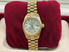 Montre Rolex femme Date just Or jaune 750/1000  Diamants et Nacre