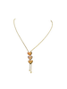 Collier or jaune 
Avec 3 cœurs