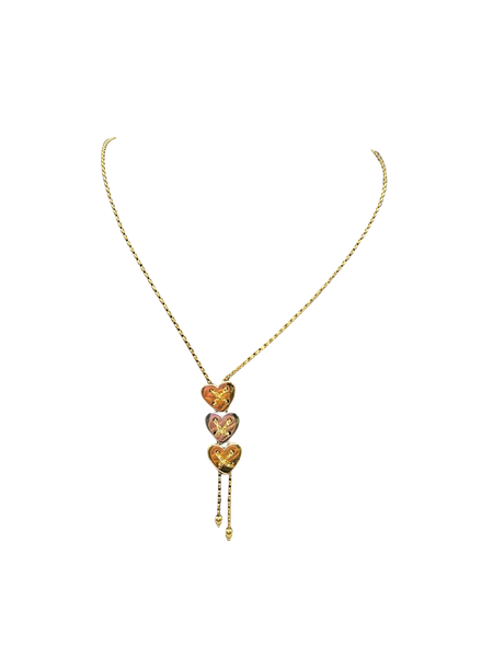 Collier or jaune
Avec 3 cœurs